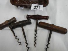 4 old corkscrews