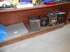 A Bush DVD player and boxed DVD sets including FA cup,