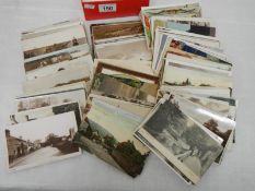 A box of loose postcards including topographical, local etc