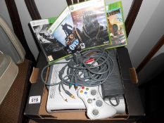 An X box 360 with games,