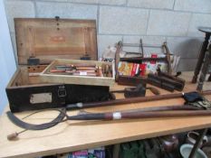A tool box and a collection of vintage and other wood working tools