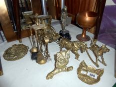 A mixed lot of brass ware including hansom cab