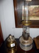 2 old oil lamps