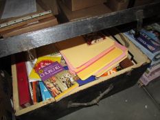 A wooden trunk and contents