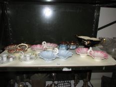 A mixed lot of china including candlesticks, one shelf