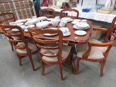 A good quality mahogany dining table and 6 chairs