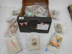 A box of collectable postcards