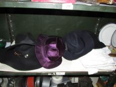 A quantity of hats, linen etc