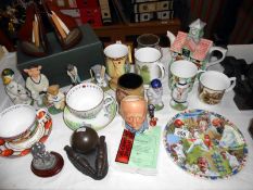 A quantity of cricket memorabilia including figures,