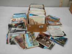 A box of approximately 400 postcards