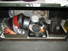 A mixed lot of bake ware, one shelf