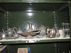A mixed lot of metal ware including pewter, one shelf