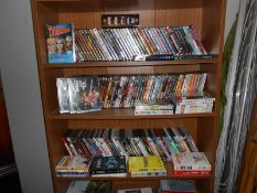 A large quantity of DVD's (3 shelves)