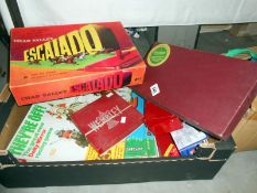 A quantity of die cast model vehicles and board games including Escalado,