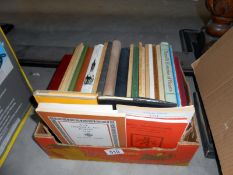 A box of books including Shakespeare,