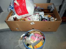 A box of various sewing items