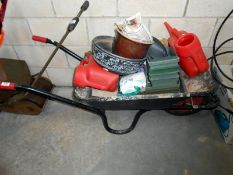 A wheel barrow and contents
