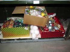 A quantity of Christmas decorations, one shelf