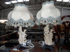 A pair of figural table lamps