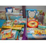 A collection of Rupert the Bear collectibles, jigsaws,