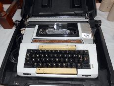 A cased Smith Corona portable typewriter