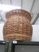 A large wicker linen bin