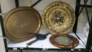 A large brass tray, a brass plaque,