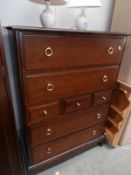 A stag chest of drawers