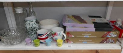 A mixed lot of kitchen ware including cake moulds & puzzles etc