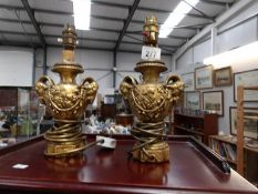 A pair of gilded table lamps