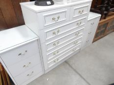 A 6 drawer chest and a pair of bedroom chests