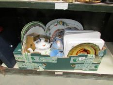 A shelf of assorted china including collector's plates