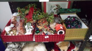 A shelf of assorted Christmas decorations