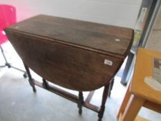 An oak gate leg table