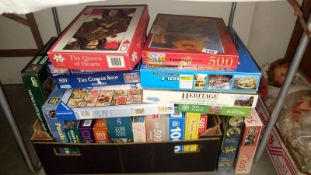 A large quantity of jigsaw puzzles