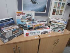 A collection of 14 boxed car model kits including Airfix 1930 Bentley etc