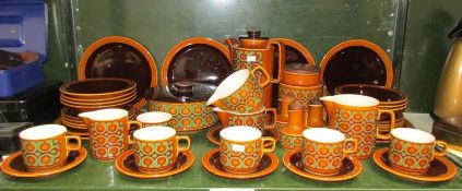 A shelf of Hornsea tea and dinner ware
