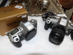 2 Canon Eos 500 camera and Sigma auto focus lens