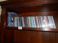 A quantity of CD's and DVD's