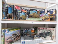 11 boxed Revell tank and military model kits together with 7 Italieri tank and military model kits