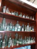 3 shelves of bottles