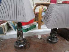 2 table lamps with carved bases