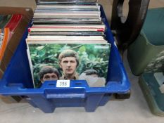 A box of assorted LP records