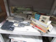 A collection of Airfix train model kits and other model kits