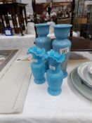 A pair of Victorian blue glass vases and a small pair of 'Greek Key' glass vases