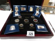 A case of gold plated and painted UK collectible coins