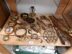 A mixed lot of brass ware,