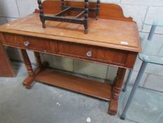 A 2 drawer Victorian mahogany side table