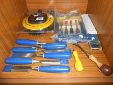 A quantity of tools including chisels