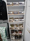 A large collection of boxed vintage 70/80's shoes and sandals in various sizes and designs (never